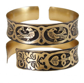 Браслет с львиными масками вогнутый